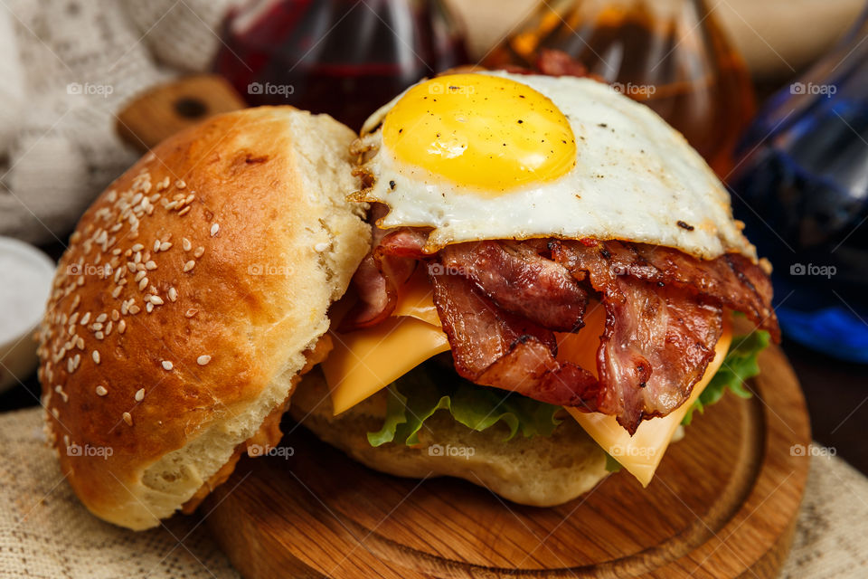 Juicy burger with egg and bacon