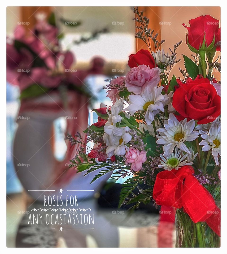 Beautiful Res Roses I’m a lovely vase shot in portrait style to accentuate the reds and subtle greens 