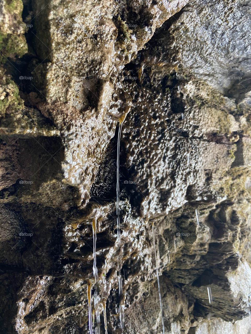 Dripping water on rock 