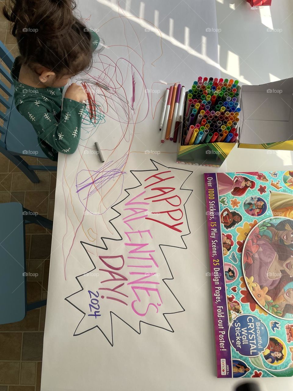 Toddler makes Valentine decoration, making decorations for Mommy, decorating for Valentine’s Day