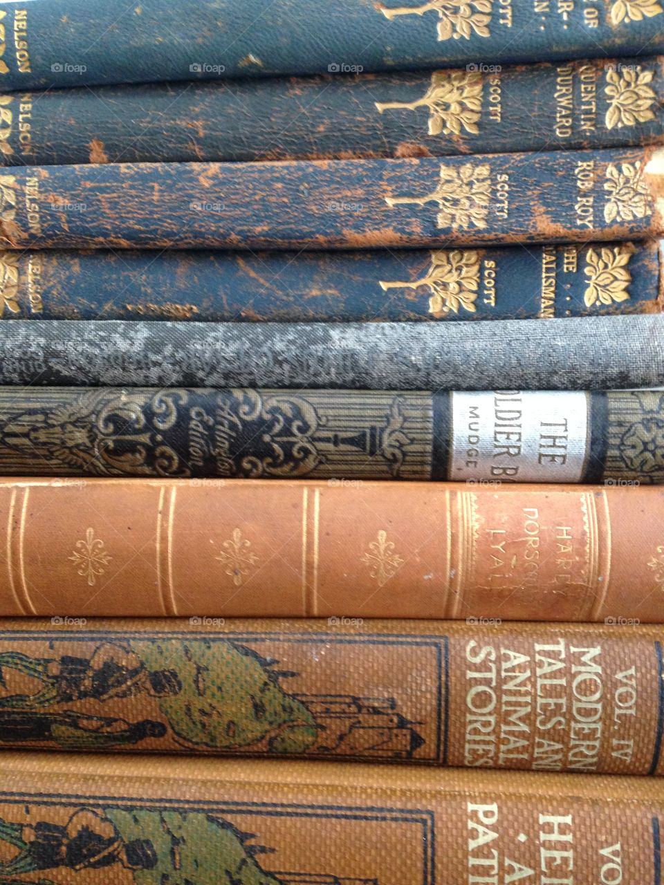 Old books. A stack of old hardcover books. 