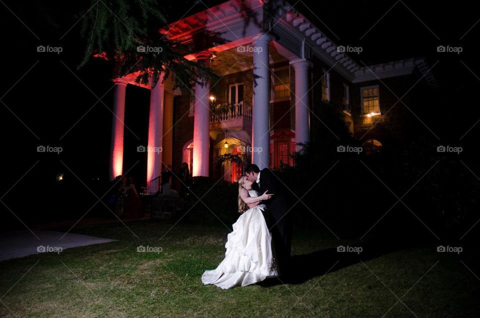 Our wedding day Oct. 7th 2011 at the Gassaway Mansion in Greenville,SC.  The blush up lighting was my idea and I thought this picture captured the beauty of color.  No editing just real photography.