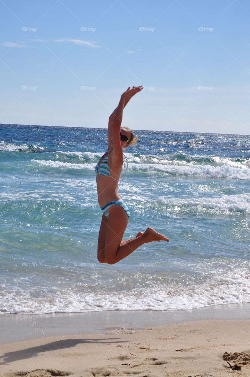 Jumping at seaside 