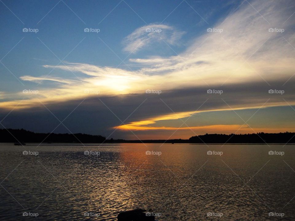Scenic view of lake during sunset