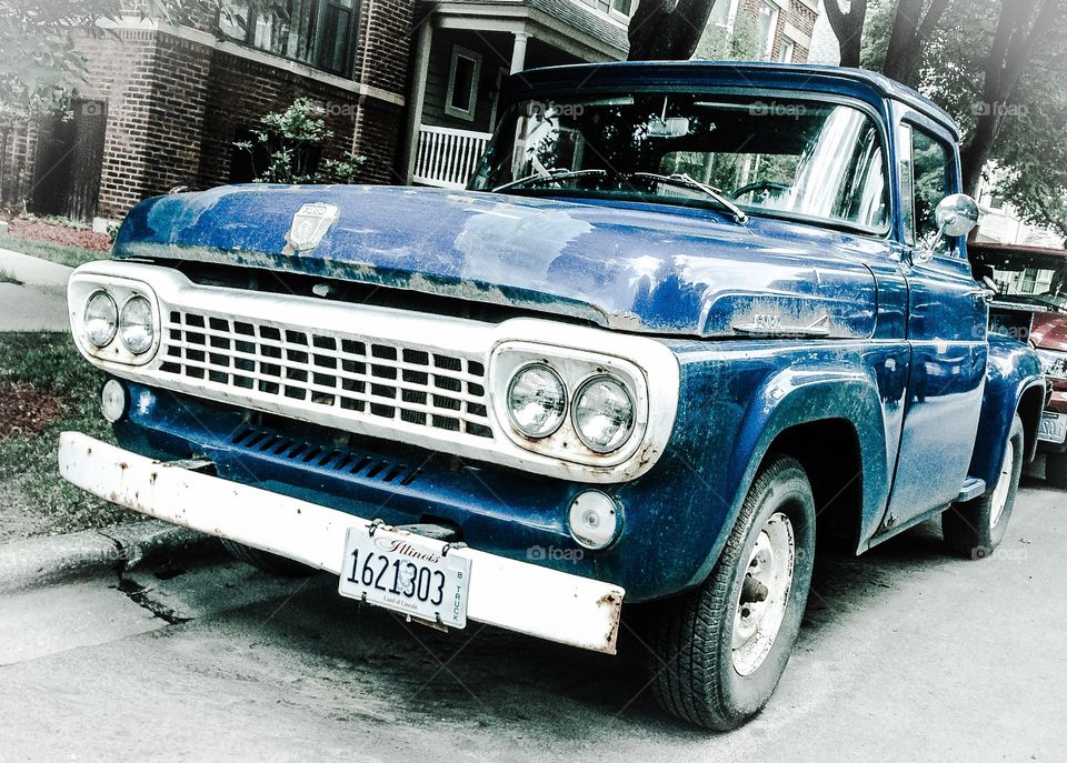 Old Ford pick up truck still cranking out the miles. 