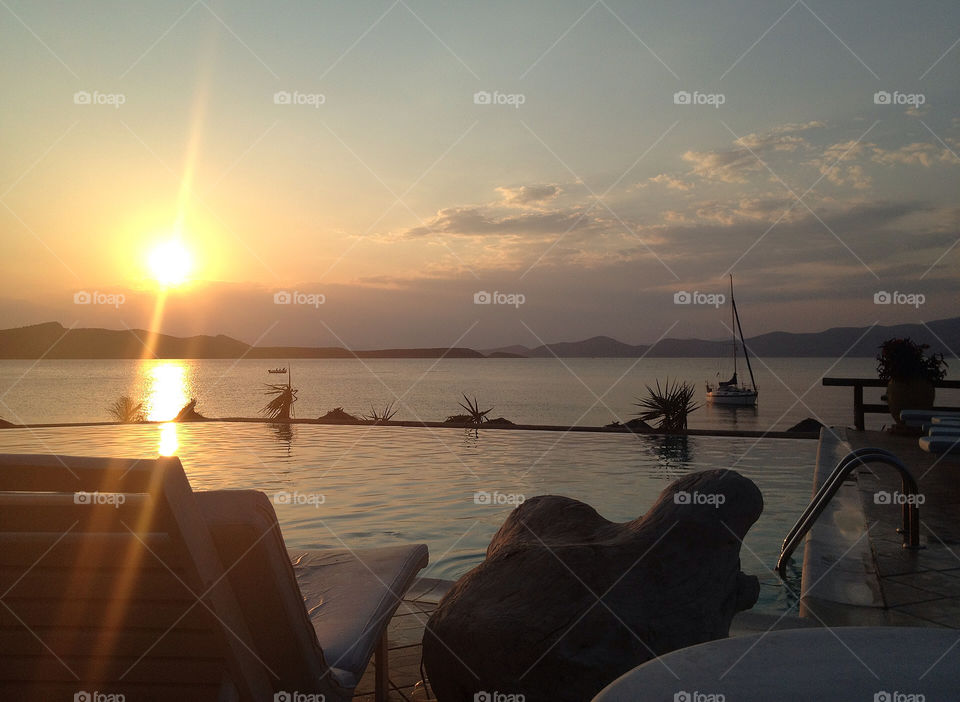 summer sunset pool island by pescaito