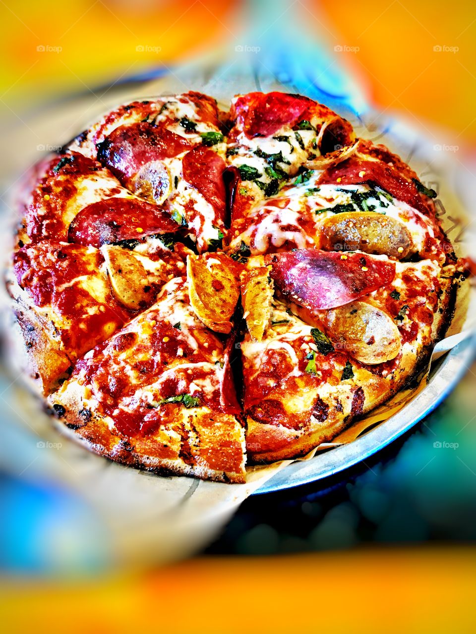 Pizza salami mozzarella tomatoes 