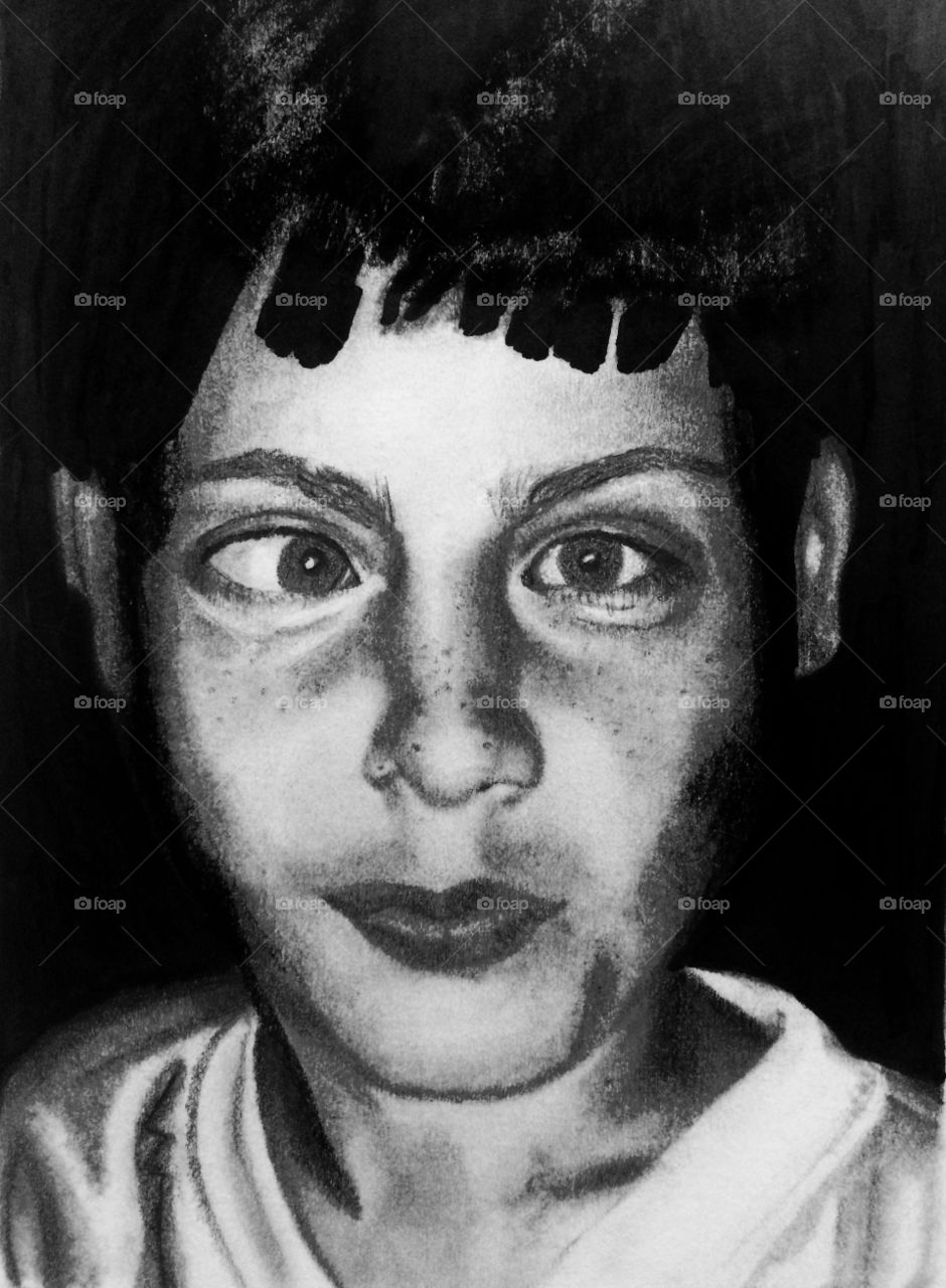 Drawing of a little boy making a funny face 