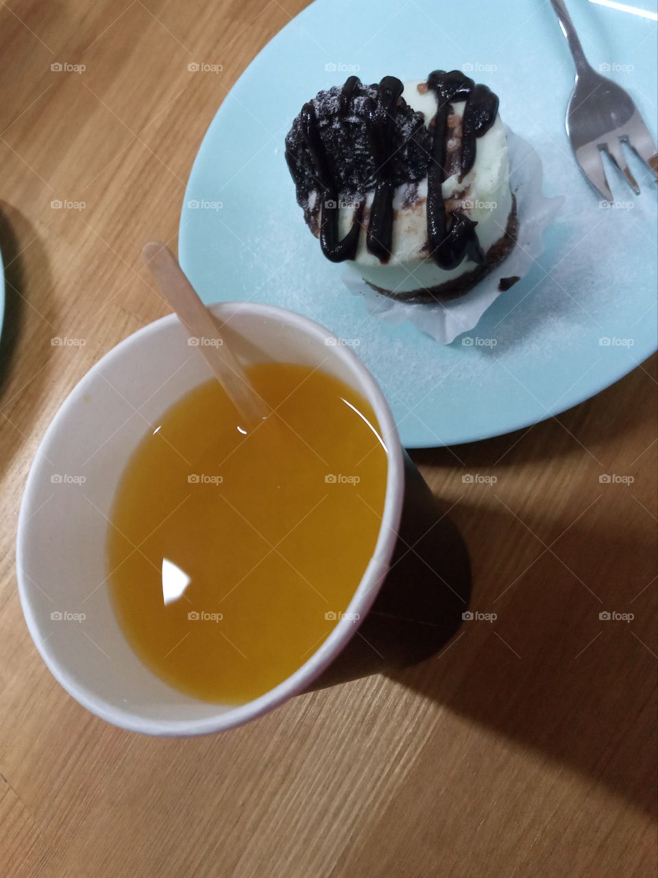 Papaya-passion fruit tea and a light dietary cake.  Beautiful morning!