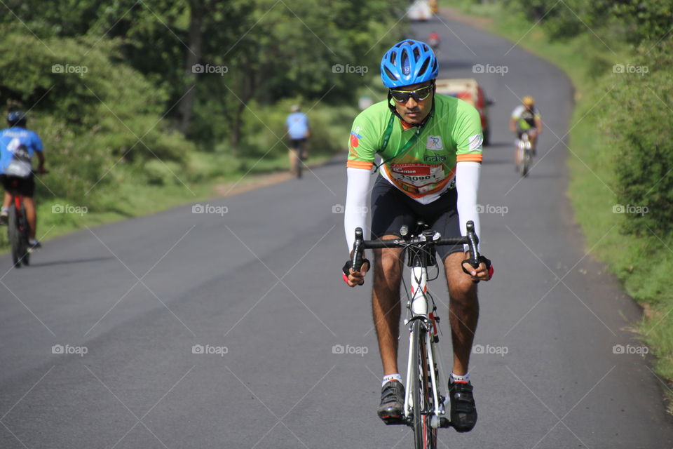 Cyclists racing in cyclotron