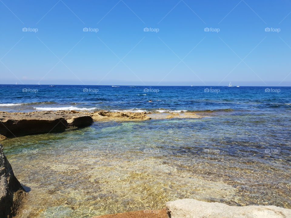 Clear blue skies and sea