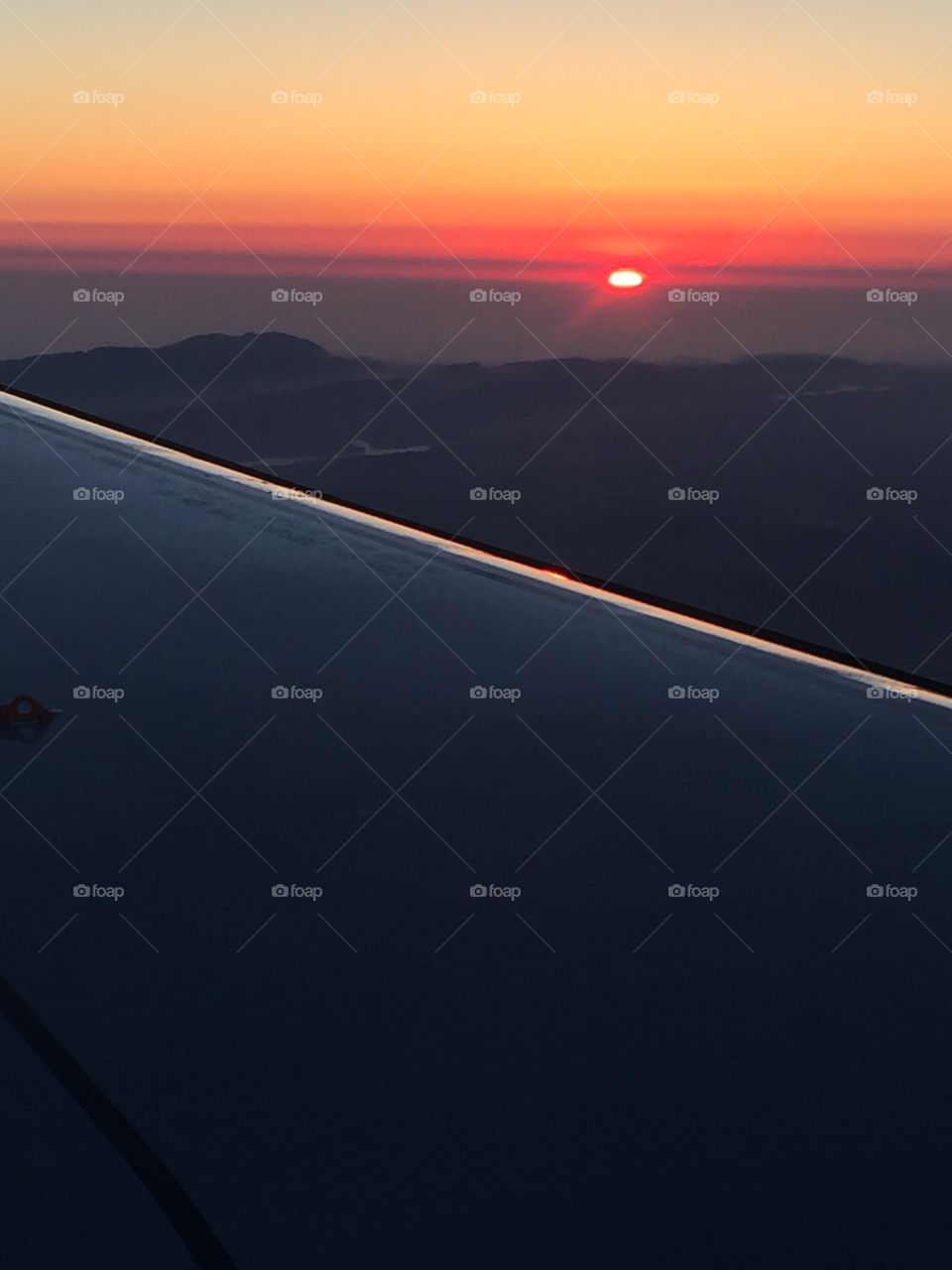 Pacific sunset from a plane