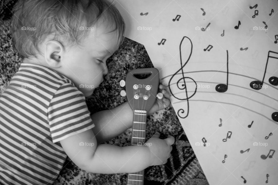 a little musician . having fun with my baby