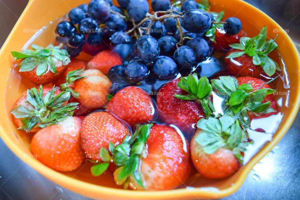 High angle view of strawberry and blueberry