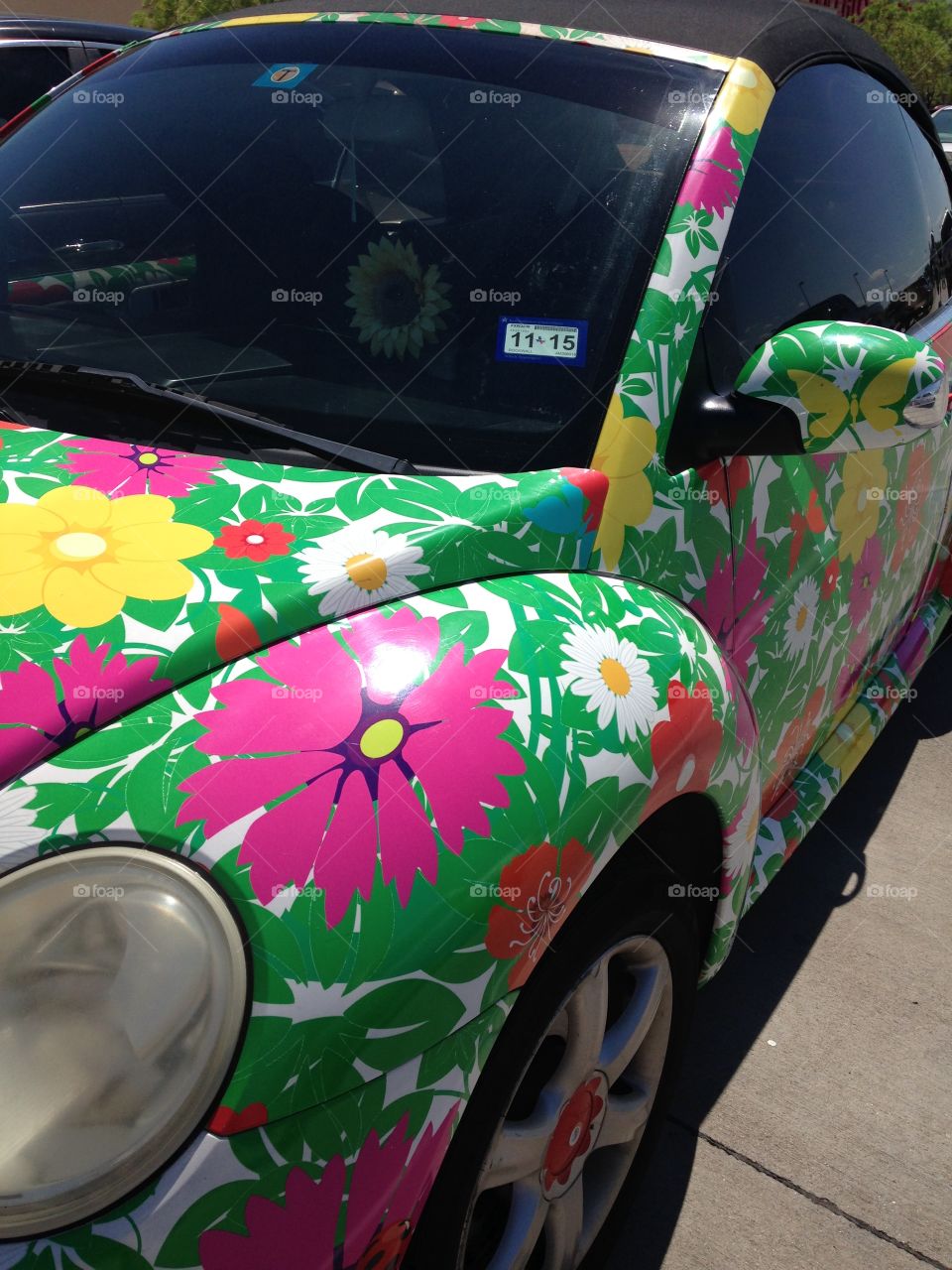 Flower power. Volkswagen Beetle with flower paint