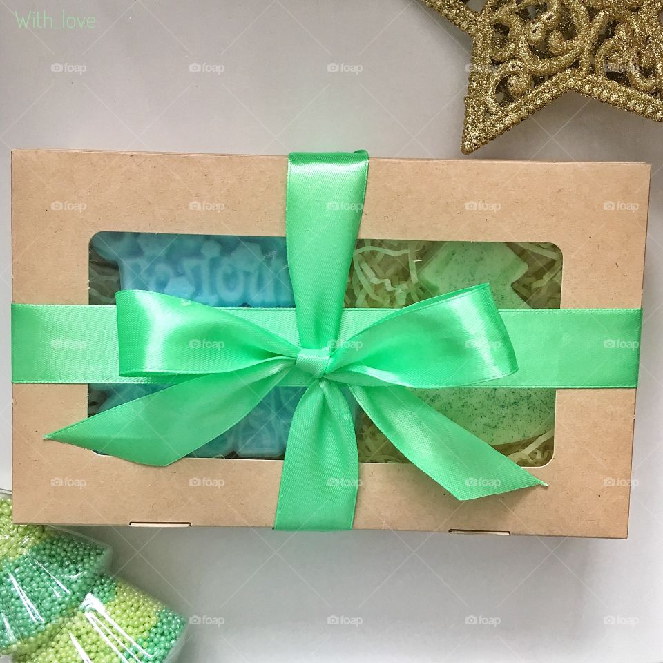 Handmade gift box with green ribbon