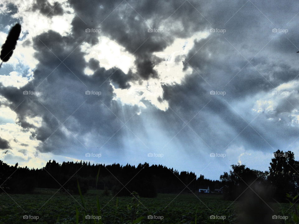 Sun cutting clouds