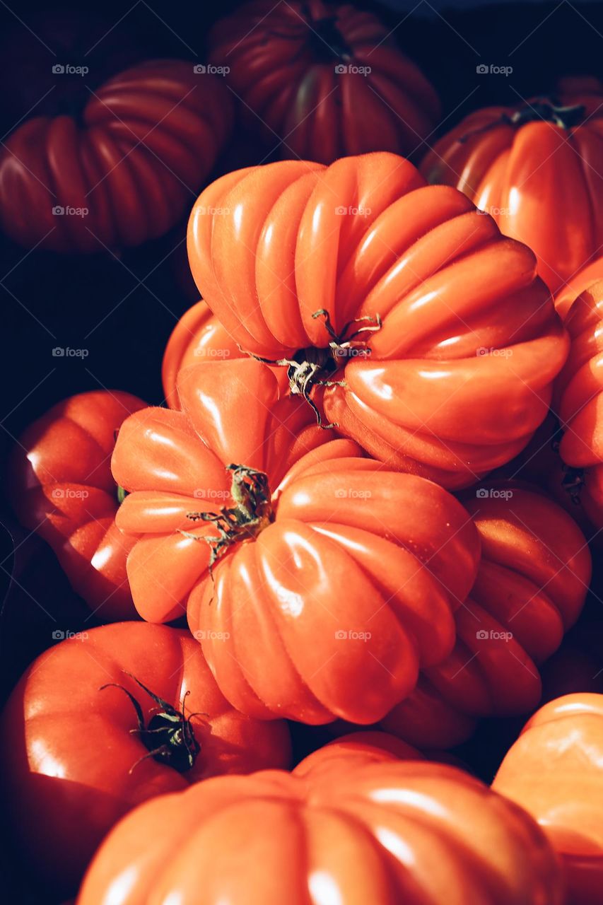 Wrinkled funny red tomatoes 