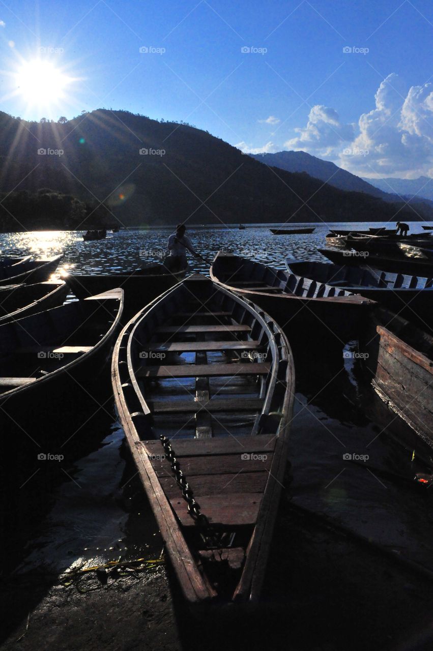 Boats in Phewa Lake in Pokhara, Nepal