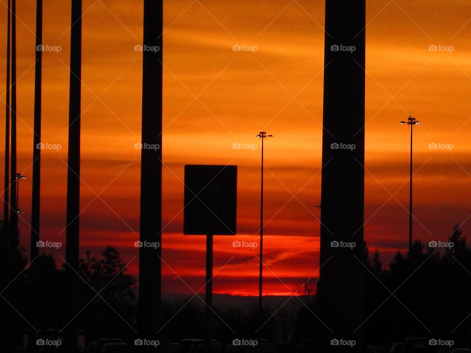 Rectangle shaped sign standing in the glow of a early morning golden hour