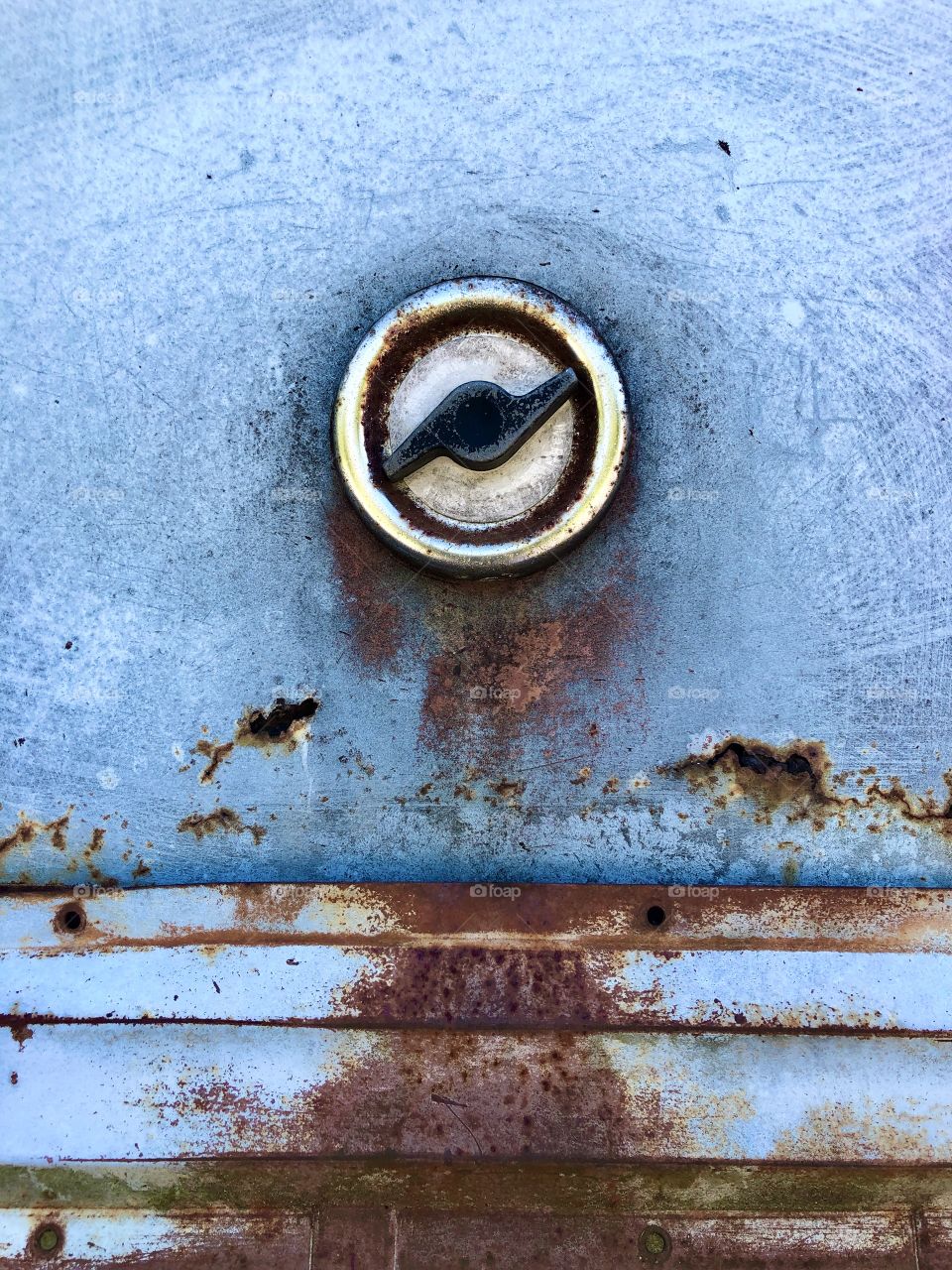 Rust on old vintage blue box truck 