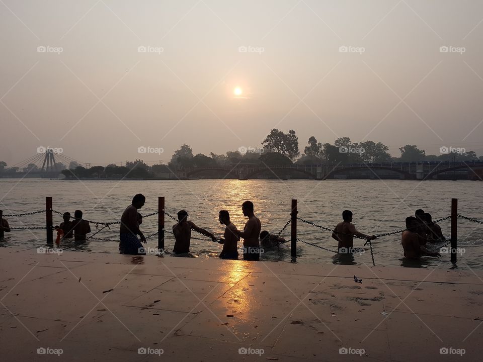 morning bath at holy river of ganges