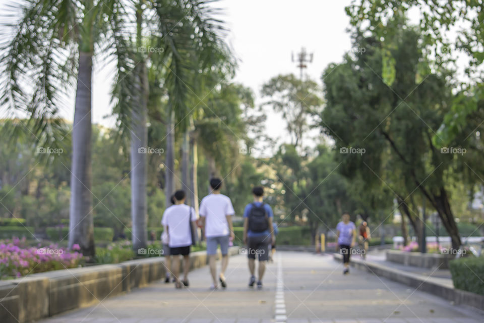 Blurry image people running exercise for health in the Benjakitti Park , Bangkok in Thailand.