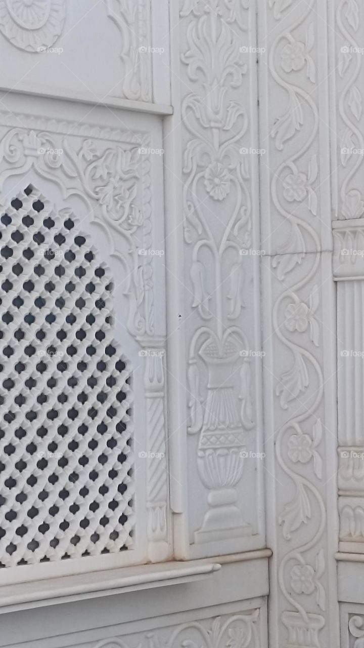 beautiful marbal carving on the walls of gurudwara holi place for sikhs. they worshiped their god throughout the day and night.