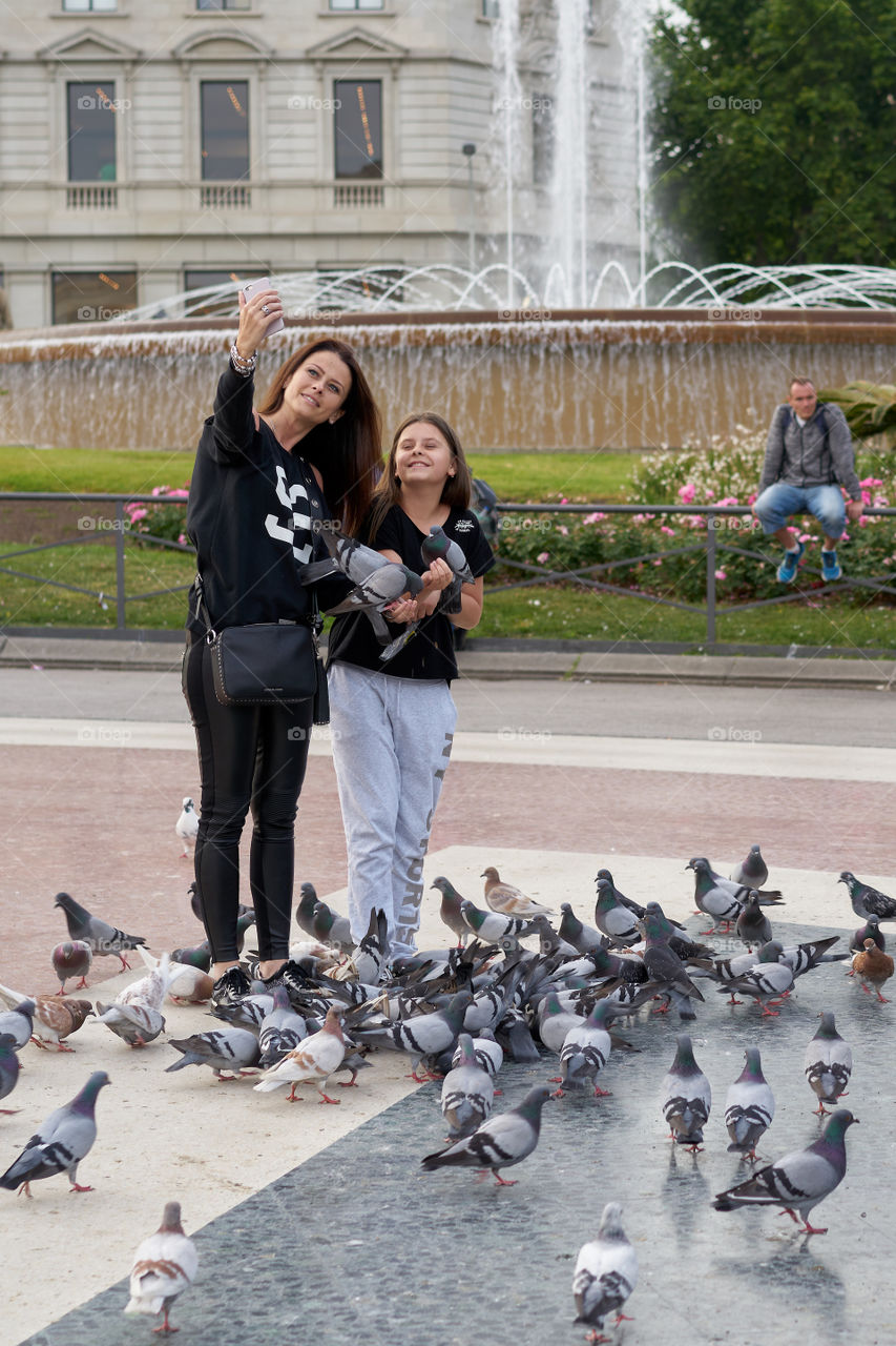 Mother, Daughter and Pigeons