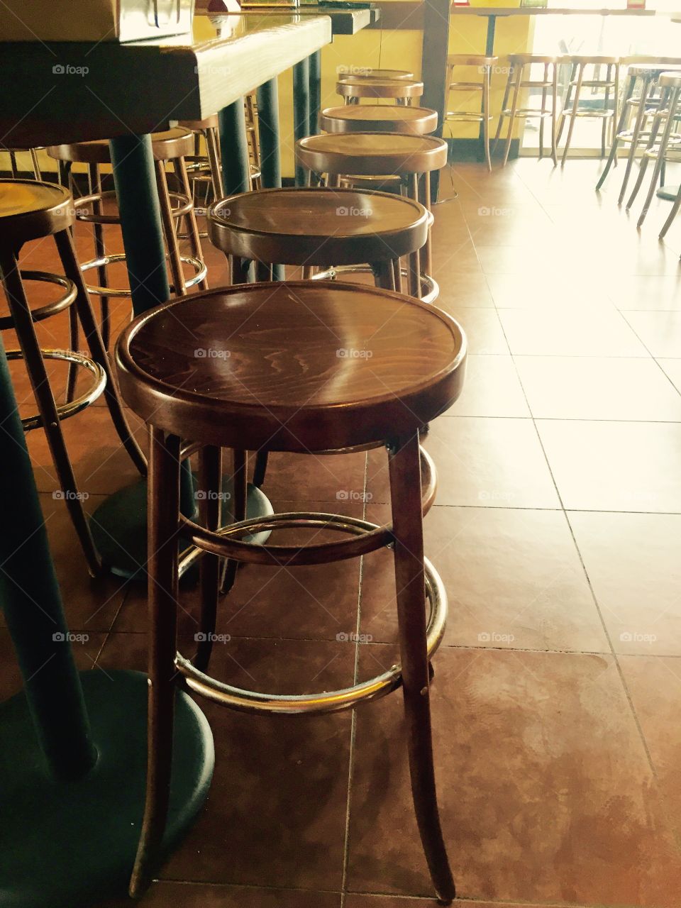 Row of Bar Stools . Restaurant seating. Bar stools. 