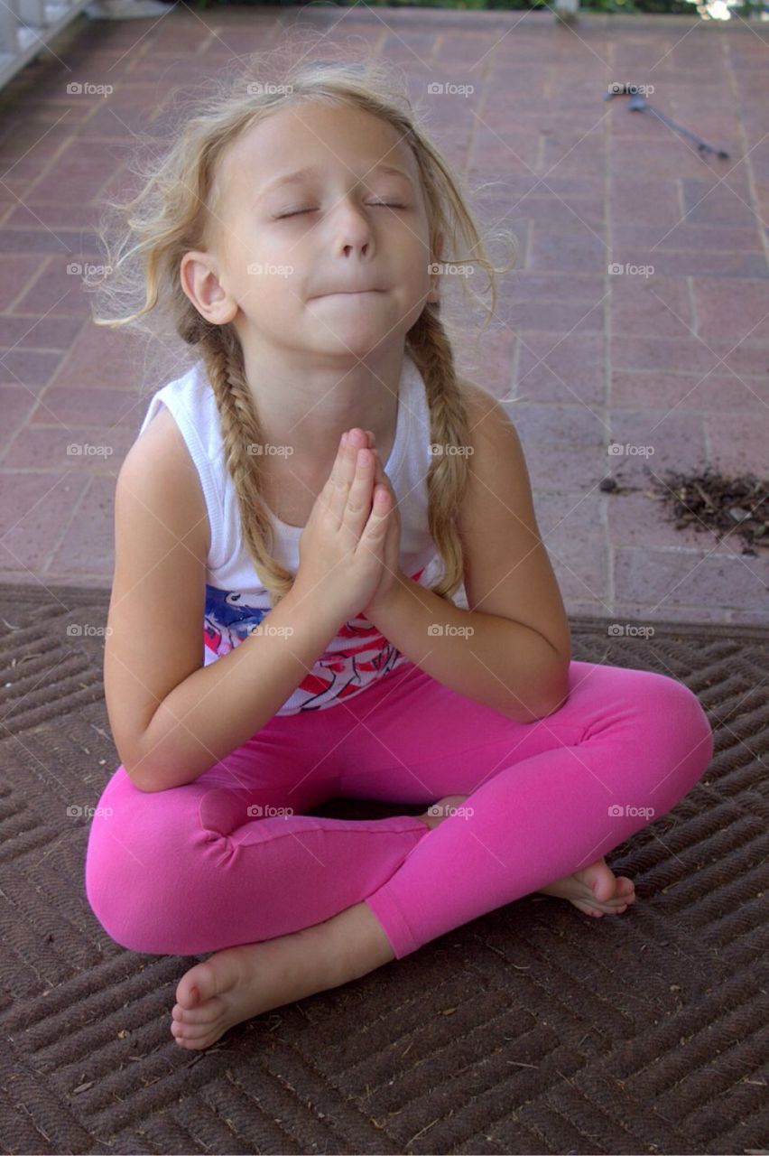 Close-up of a girl praying