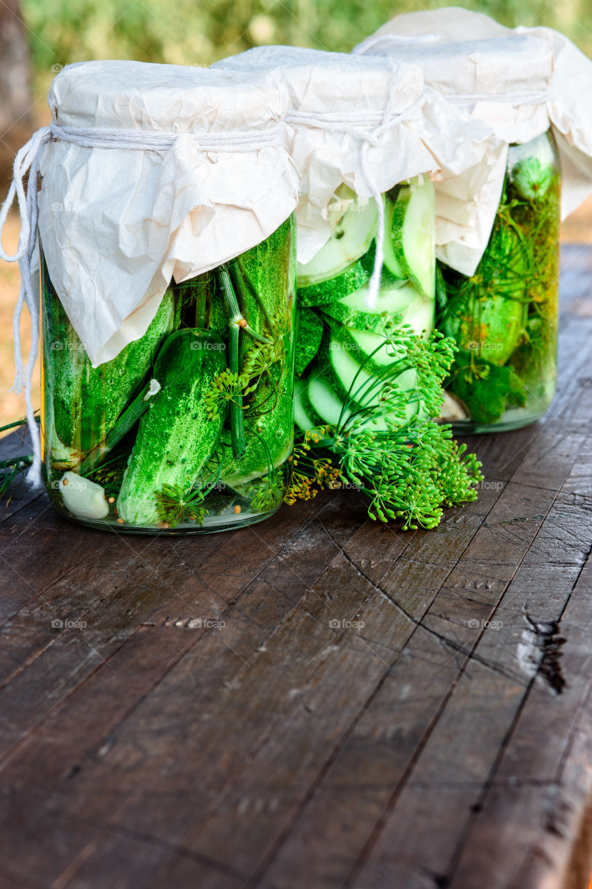 Pickled cucumbers. Pickled cucumbers made with home garden vegetables and herbs