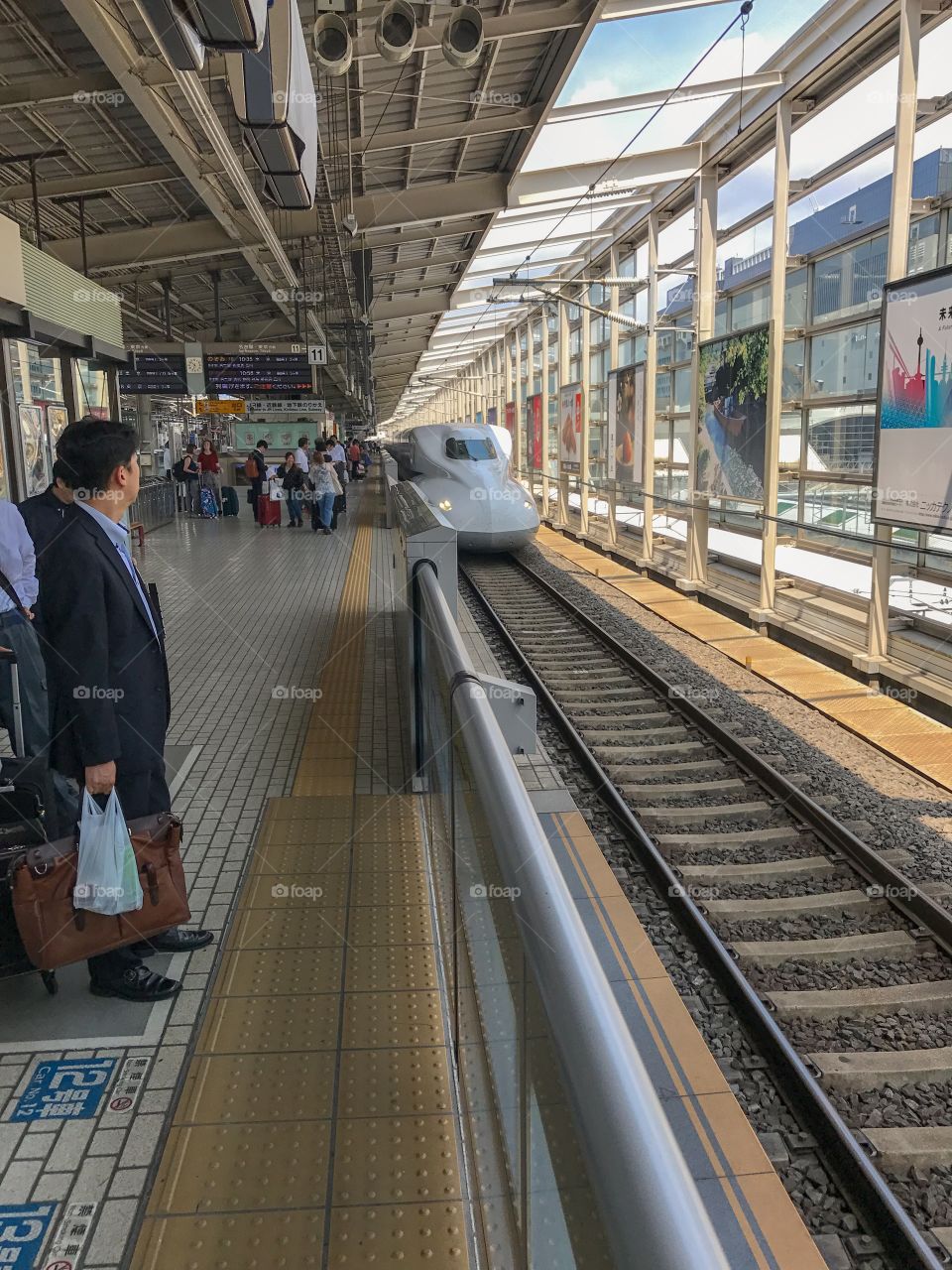 Waiting for the arrival of Shinkansen; the iconic Bullet trains of Japan...