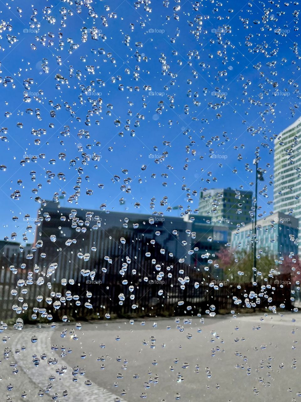 Waterdrops window in the city