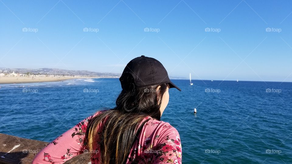 woman looking out the sea view