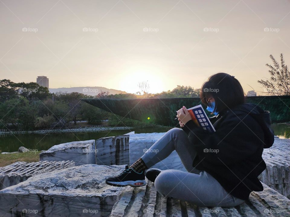 enjoying reading in the beautiful scenery