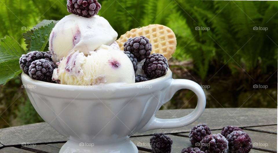 Blackberry ice cream in cup