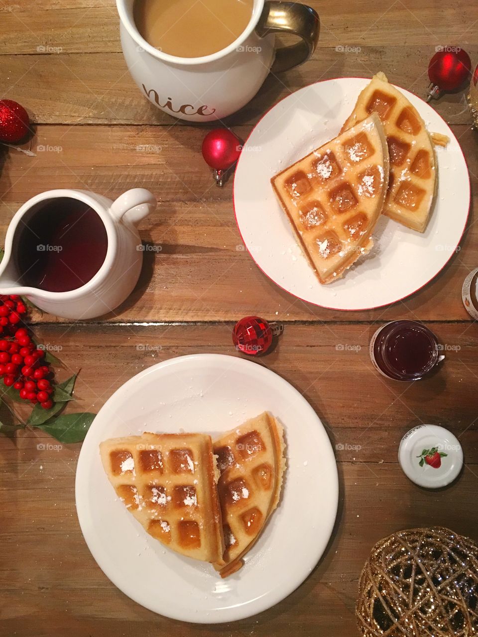 Homemade breakfast with coffee, waffles and maple syrup.