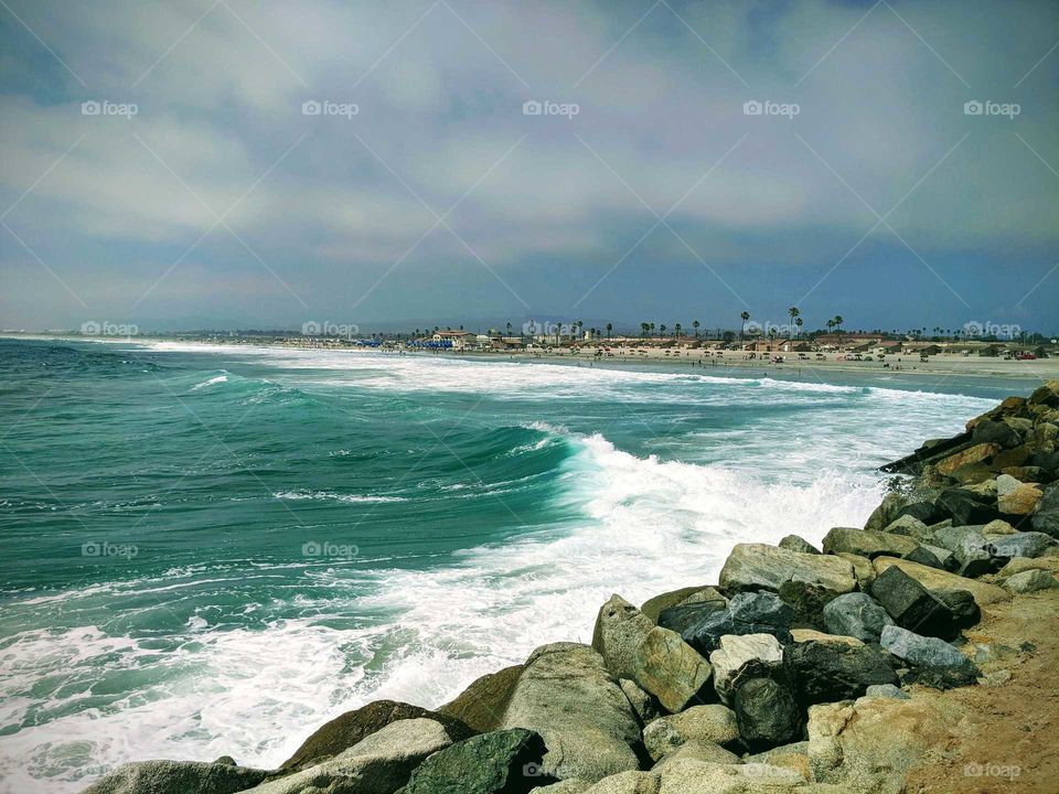 Southern California Beach with turquoise waters and foaming waves