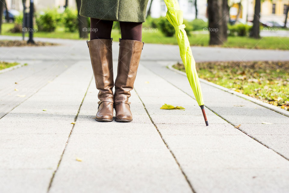 boots,umbrella and woman in fall