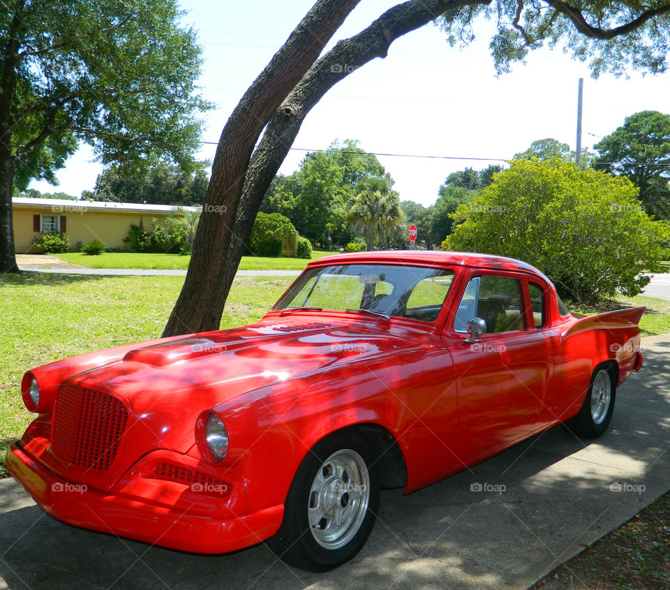 Custom red car! The Red Story! Red is color of passion. It's the color that is always seen on heart decorations on Valentine's Day! Red is astonishing, exhilarating, and fills your world through feelings and emotions!