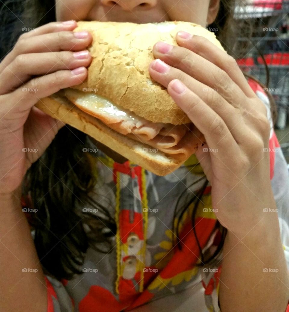 Holding a sandwich