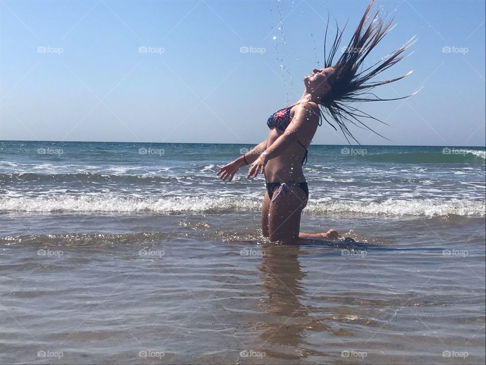 Hair flipping at the beach 