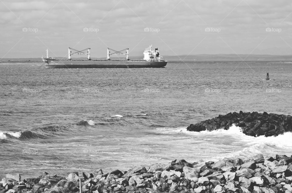 Large boat coming into the harbor.