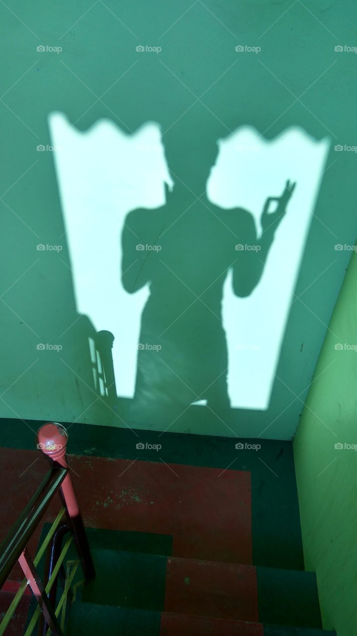 shade of man in steps