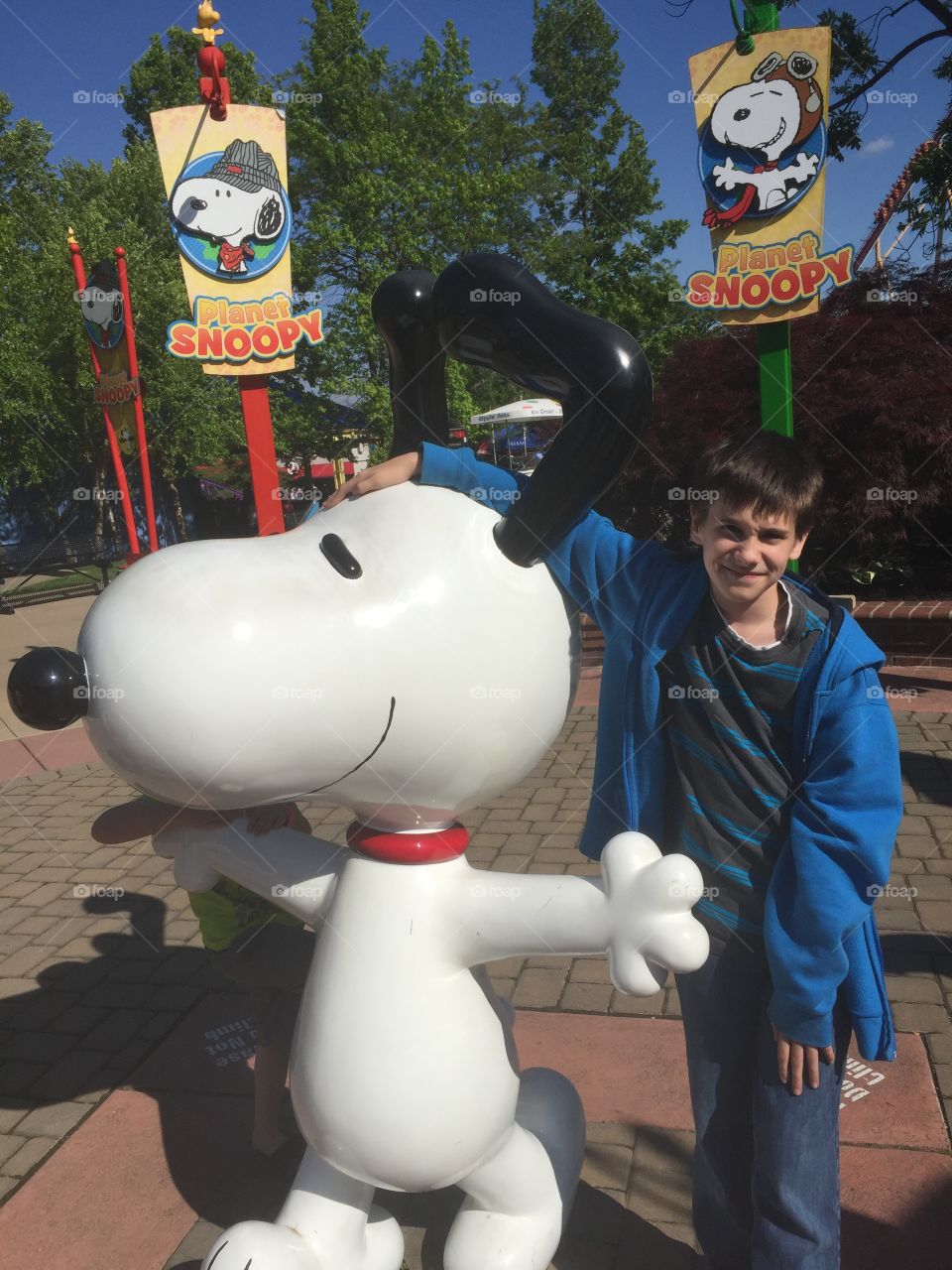Kid at planet snoopy kings island 
