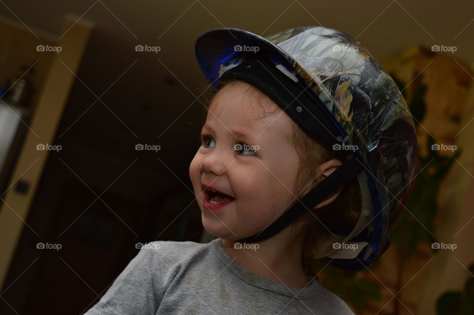 Child in a unique helmet