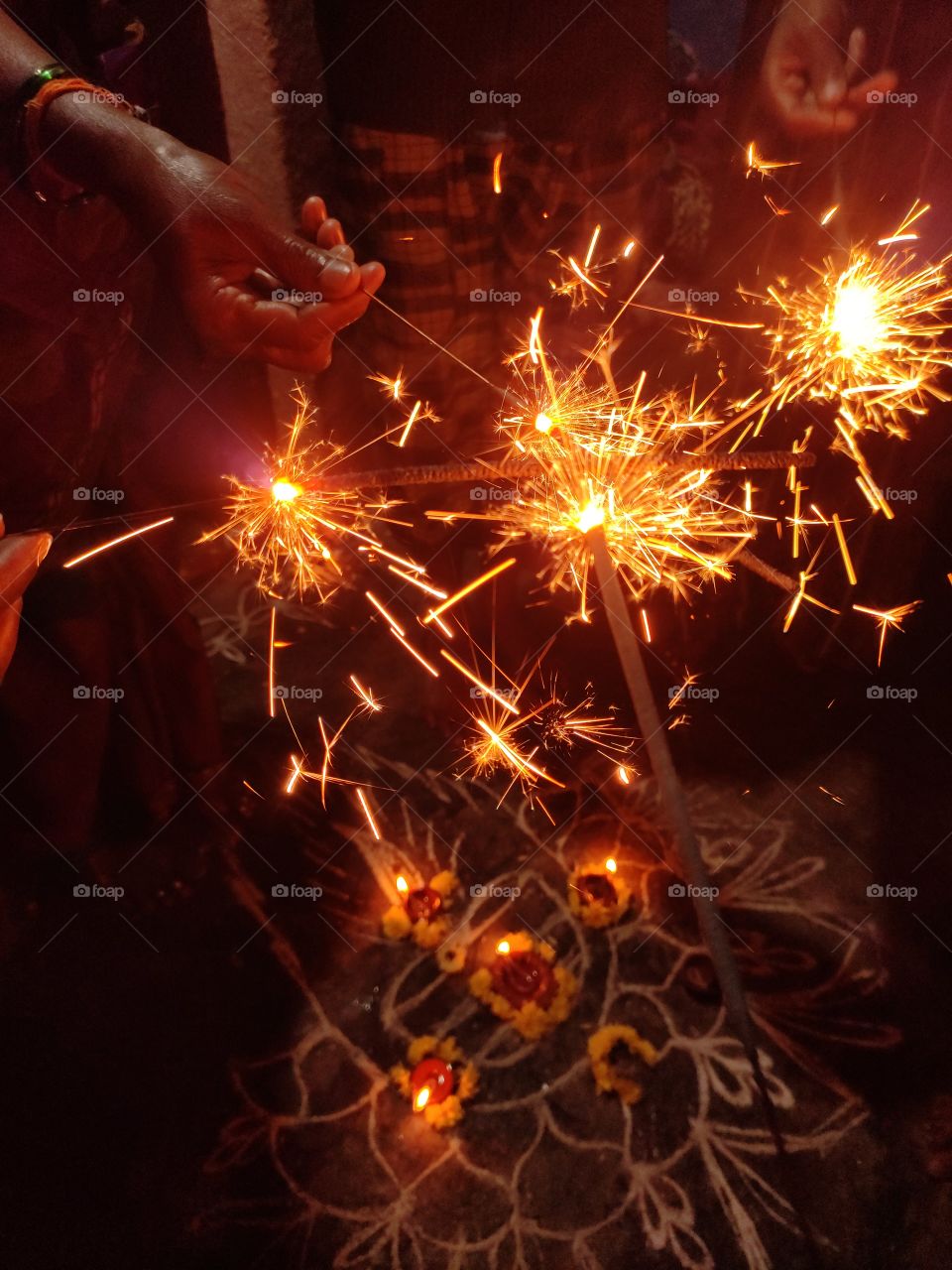 bursting crackers on Festival of Lights - Deepavali