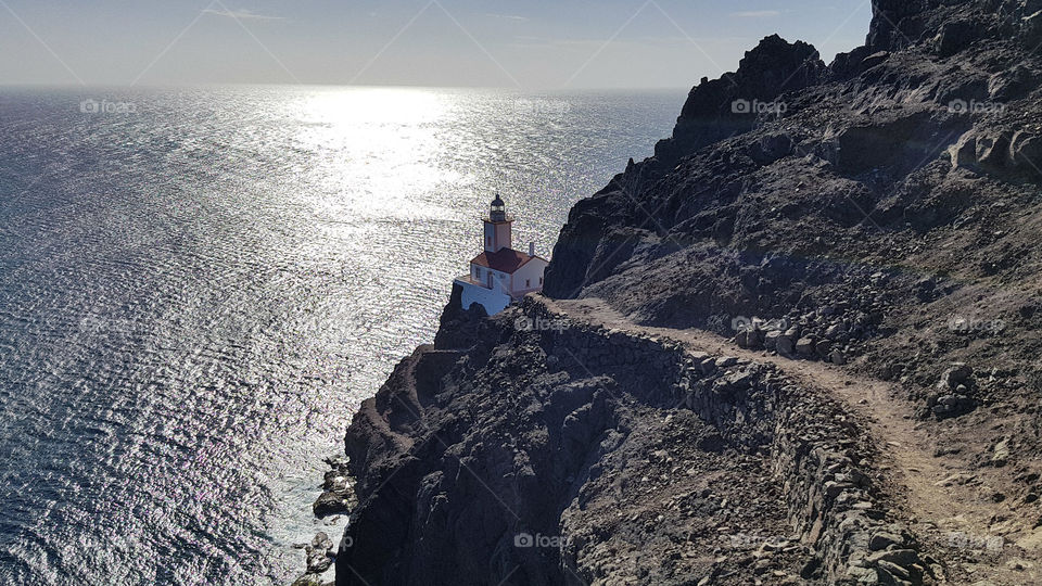 A lighthouse far away from the city, tranquility