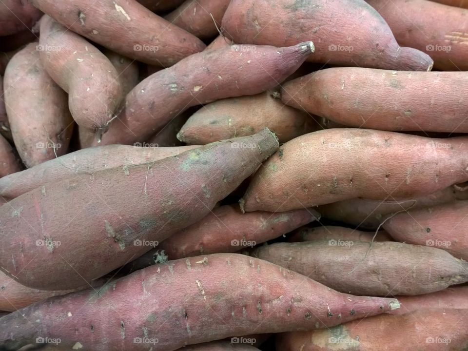 Sweet potatoes in a market.